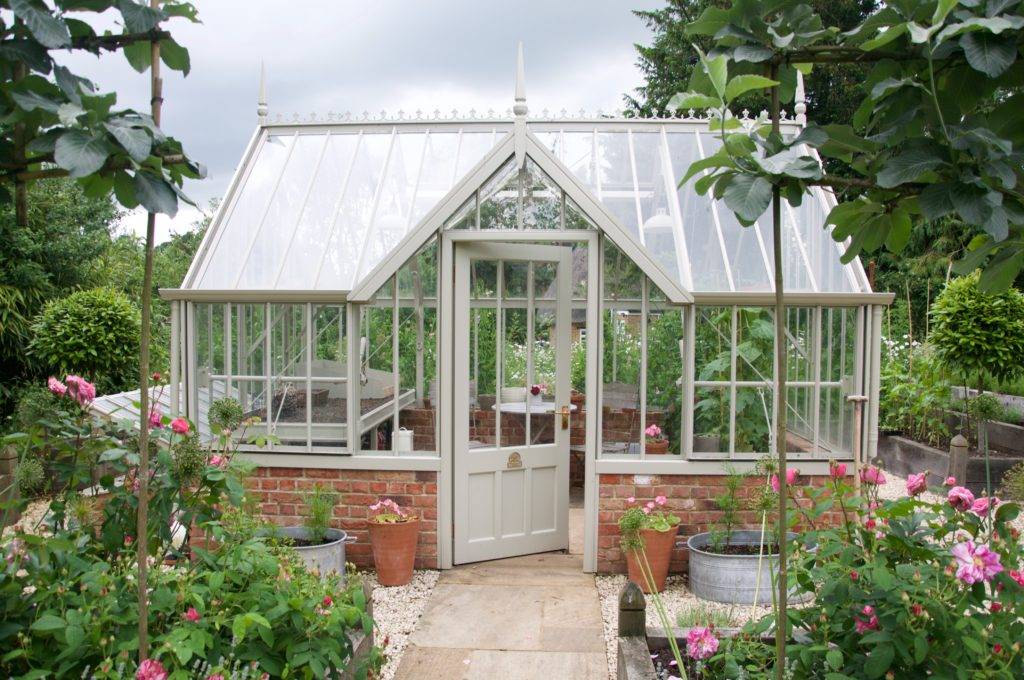 alitex national trust mottisfont greenhouse in a leafy garden
