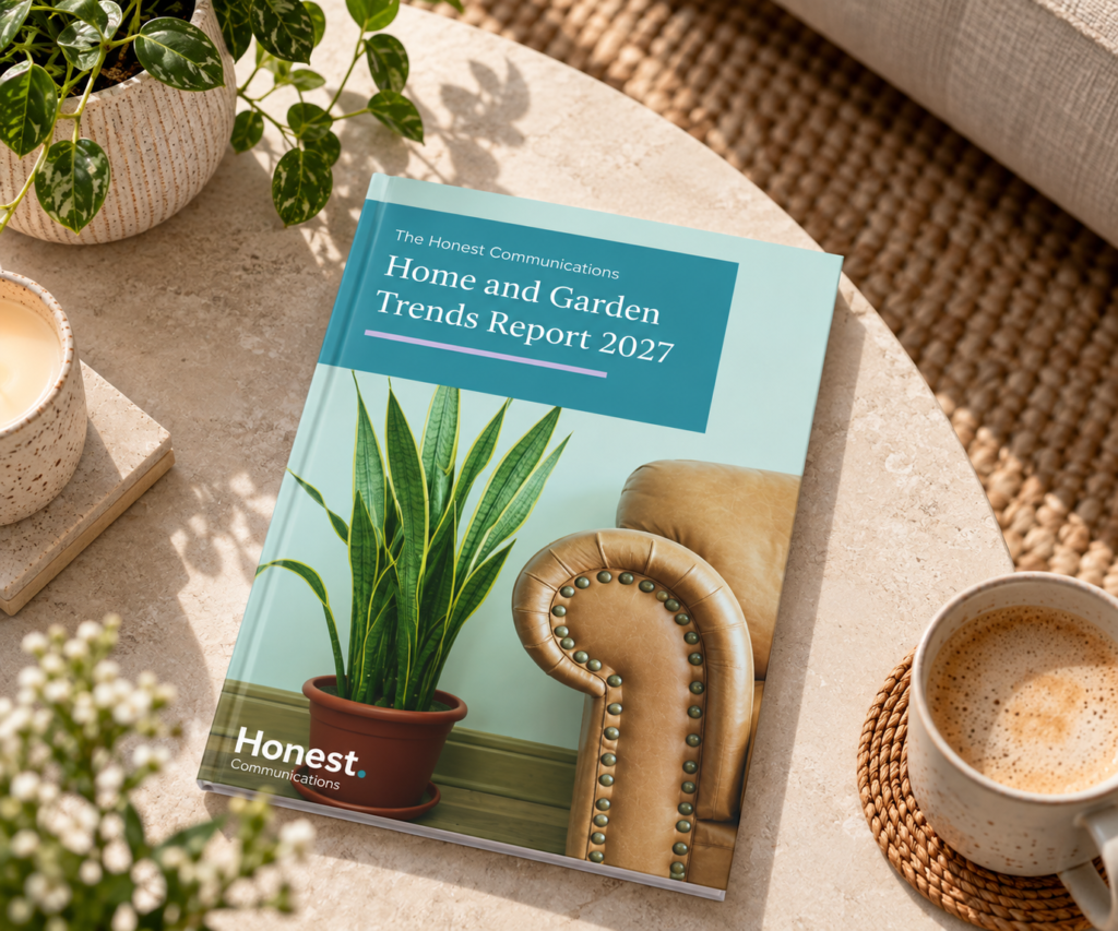 2027 Trends Report on a coffee table with foliage and coffee